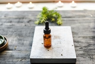 Picture shows a bottle of an essential oil blend for wellbeing