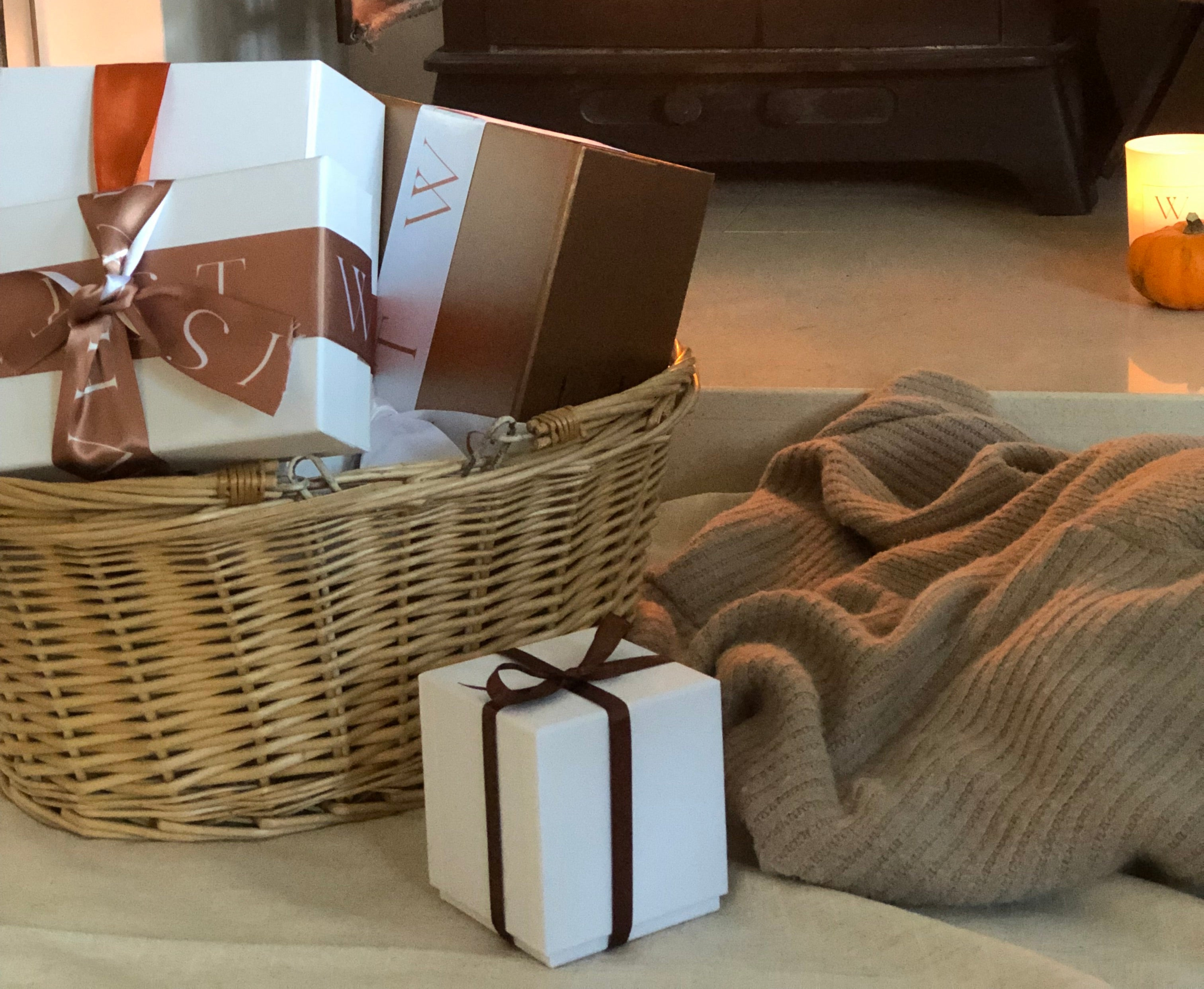basket of gifts wrapped for christmas